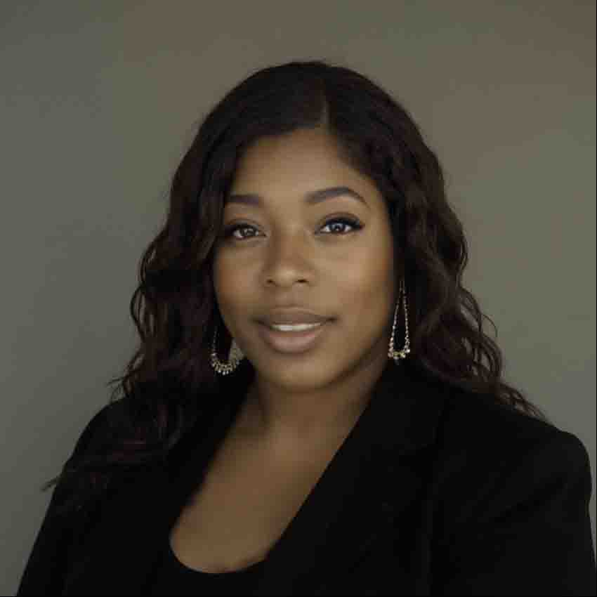 Professional headshot of Tyrie Reed